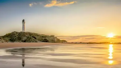 Covesea Lighthouse from the West Beach | Beaches and Castles Tour